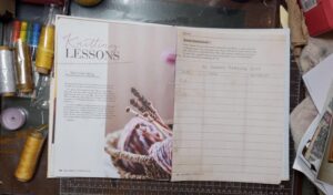 Open Journal on table, left page is an article titled Knitting Lessons, right page is formatted to look like old library check out cards with the title My Summer Reading List.